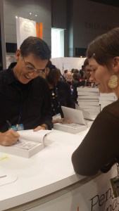 Justin Cronin signs my book. (Photo by Emily Lewis)