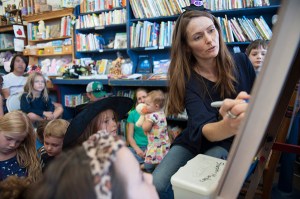 Writer/illustrator Jenni Palmer reading and signing her new book, The Wompananny Witches Make One Mean Pizza" at Once Upon a Time Bookstore in Montrose, CA, on August 20, 2017. (Photo by Miguel Vasconcellos, courtesy OC Fair and Event Center)